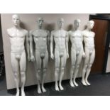 Five male shop mannequins on shop stands (three complete)