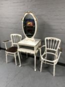 A white and gilt twin sided vanity table with mirror and two painted bentwood chairs (one seat pad