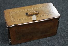 A late Victorian inlaid mahogany sewing machine box