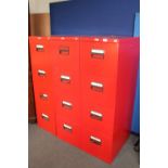 Three red metal four drawer filing chests (two with keys)