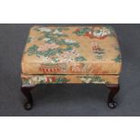 A mid 20th century footstool