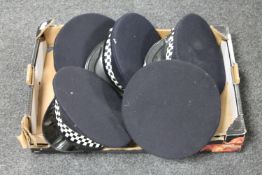 A box of five police caps