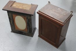 A continental mahogany wall cabinet and a mirror door wall cabinet