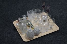 A tray of cut glass perfume bottles with stoppers, pair of glass candlesticks,