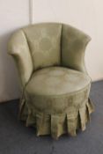 A mid 20th century bedroom chair in green brocade