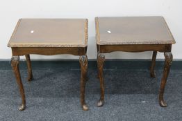 A pair of beech glass topped lamp tables