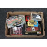 A box of assorted boxed die cast vehicles - Burago Chevrolet, Maisto corvette,