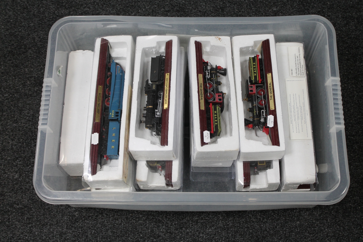 A box of twenty-three die cast model trains on wooden plinths - Image 2 of 2