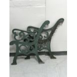 A pair of cast iron bench ends