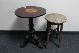 A circular Victorian mahogany occasional table and an oak plant stand