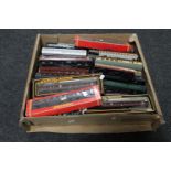 A box containing boxed and unboxed die cast rolling stock including Hornby and Mainline