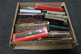 A box containing boxed and unboxed die cast rolling stock including Hornby and Mainline