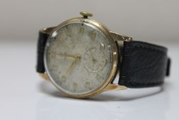 A gent's vintage 9ct gold Tudor wristwatch