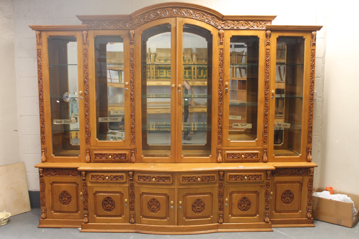 An impressive oriental style high gloss glazed, breakfront bookcase,