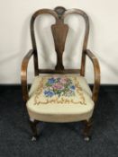 A 20th century beech bedroom armchair upholstered in tapestry fabric