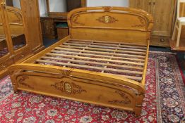 An oriental style parcel gilt 6' bed frame