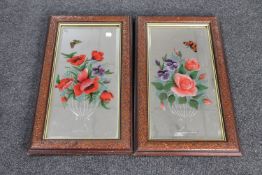 A pair of antique hand painted hall mirrors depicting flowers and butterflies