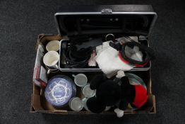 A box containing assorted tea ware, glasses, vintage hoover,