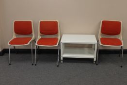 Three Norwegian plastic chairs designed by Bendt Winge of Oslo on chrome legs and a metal two tier