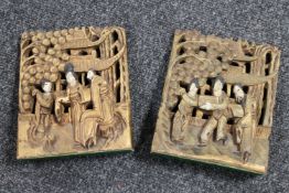 A pair of carved and gilded Chinese bookends