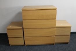 An Ikea oak effect four drawer chest and pair of two drawer chests
