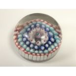 A late 19th century millefiori paperweight,