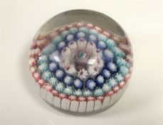 A late 19th century millefiori paperweight,