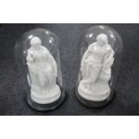 Two Parian female figures under Victorian glass domes