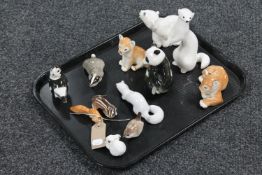 A tray containing twelve Russian Lomonosov animal figures