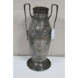 A WMF twin-handled vase decorated with an armorial