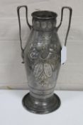 A WMF twin-handled vase decorated with an armorial