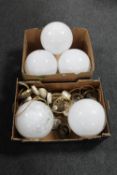 Two boxes of opaque globe glass light shades with pendants