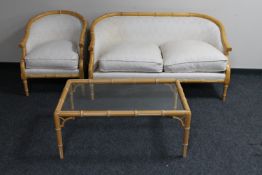 A three piece wood framed conservatory suite comprising of two seater settee,