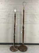 Two 20th century mahogany standard lamps