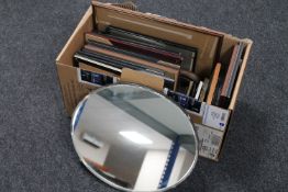 A box of unframed mirror,