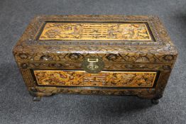 A small carved camphor wood chest