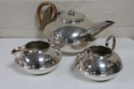 A three piece silver plated Art Deco tea service