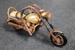 A hand built wooden model of a motor bike