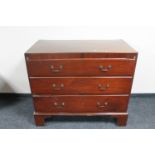 A Victorian mahogany three drawer chest (one foot needs attention)