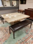 A contemporary granite dining table, 150cm by 150cm,