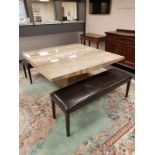 A contemporary granite dining table, 150cm by 150cm,