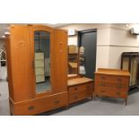 A 1930's oak three piece bedroom suite