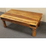 A sheesham wood coffee table