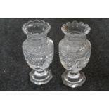 A pair of Webb Crystal vases (a/f) CONDITION REPORT: Chip to underside of base on