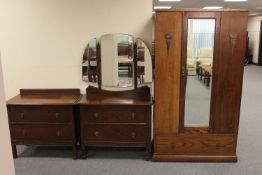 A 1930's oak three piece bedroom suite