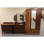 A 1930's oak three piece bedroom suite