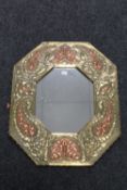 A copper and brass octagonal Arts & Crafts framed mirror