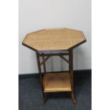 An octagonal occasional table on bamboo base