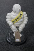 A cast iron figure - seated Michelin man