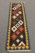 An Eastern flat weave runner,